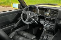 <p>There was nothing spectacular with the Integrale dash shape; it was all about the display. It’s considered to be one of the most iconic features of the car: <strong>yellow script with yellow needles</strong>, working perfectly against the darker back panel. The speedo functioned conventionally while the rev counter would swoosh towards the sky when mashing the accelerator. All of this, combined with a glorious soundtrack, was a quick reminder that you were piloting something rather special.</p>