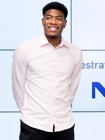 <p>Tomohiro Ohsumi/Getty</p> Rui Hachimura at the NEC headquarters in 2021 in Tokyo, Japan.