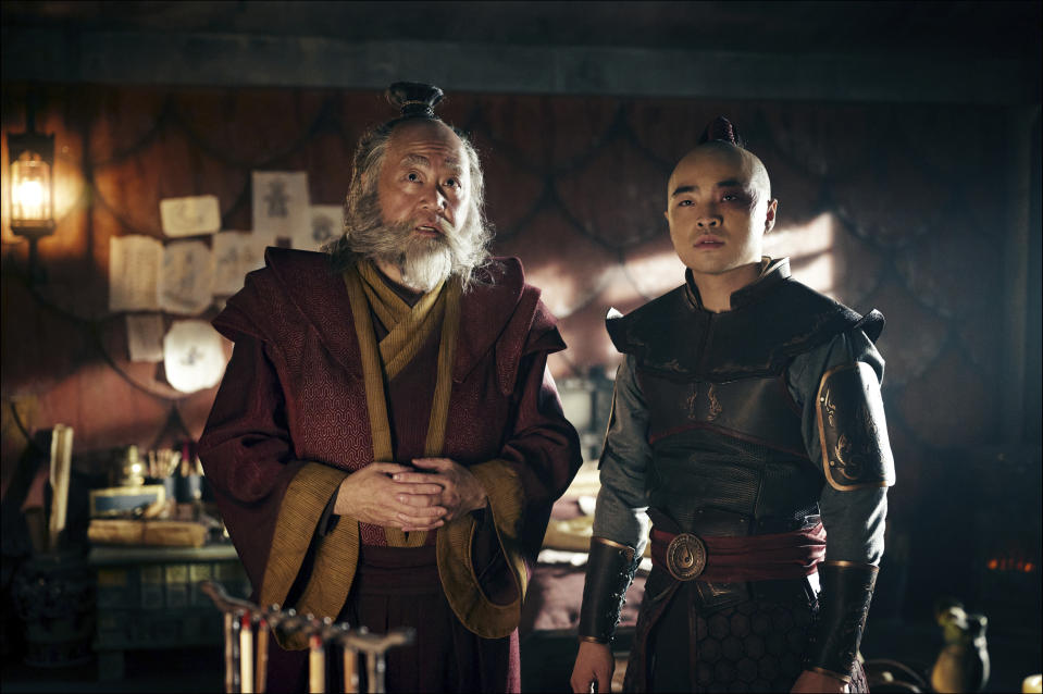 This image released by Netflix shows Paul Sun-Hyung Lee, left, and Dallas Liu in a scene from the series "Avatar: The Last Airbender." (Robert Falconer/Netflix via AP)
