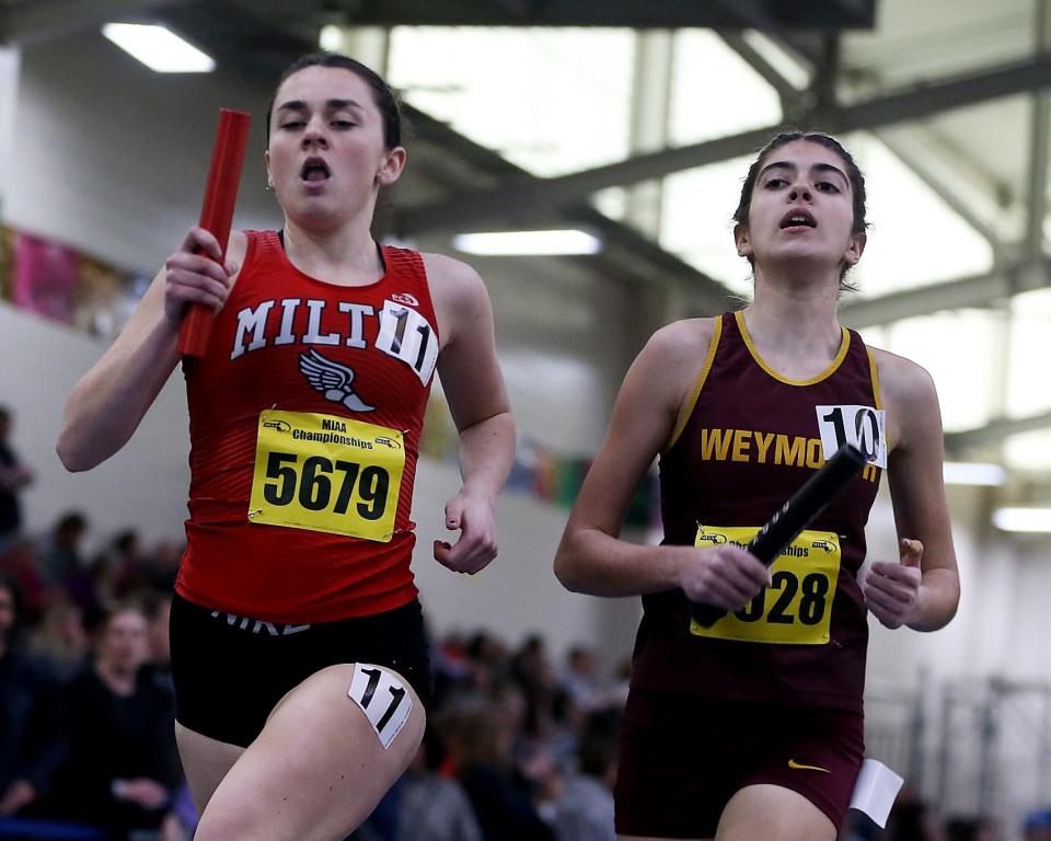 Weymouth's Isabella Galusha, right, competes in the 4x800m relay race at the MIAA Meet of Champions at the Reggie Lewis Track Center in Boston on Saturday, Feb. 25, 2023.