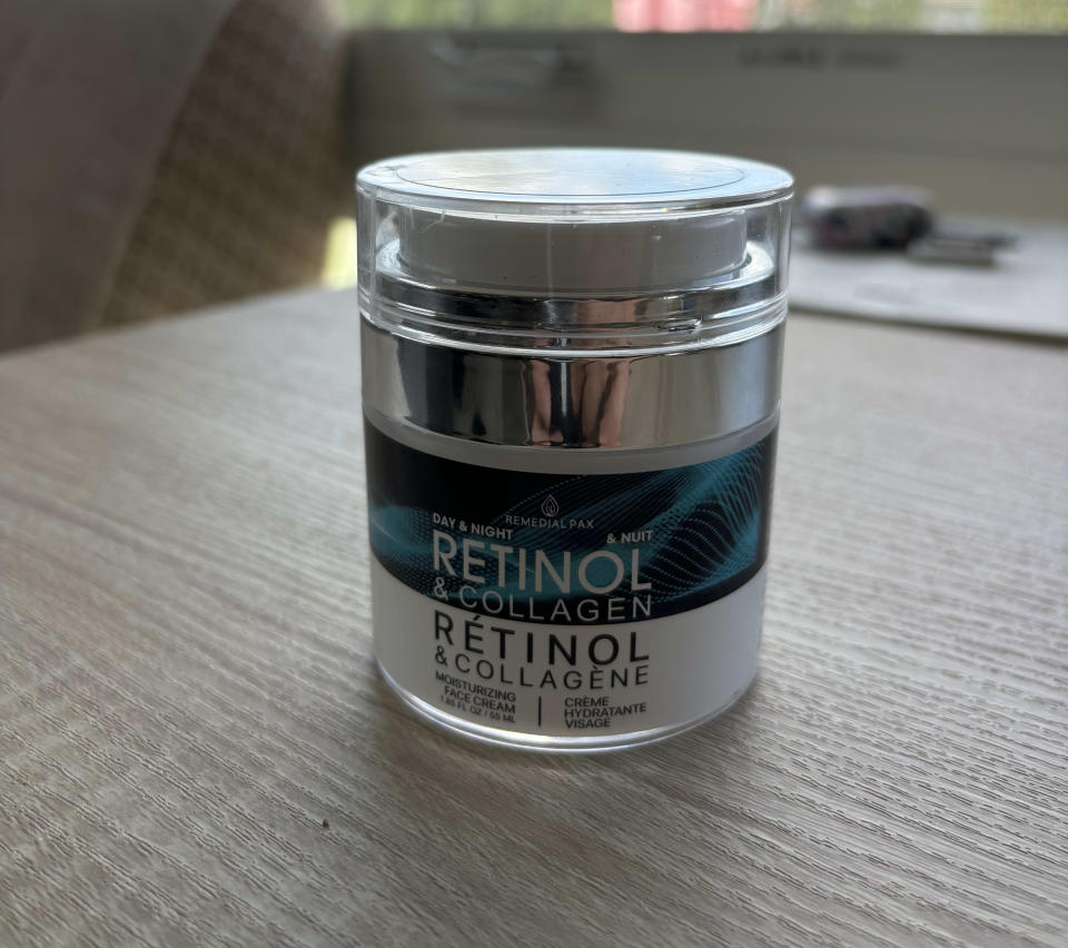 the amazon retinol moisturizer on a wood surface