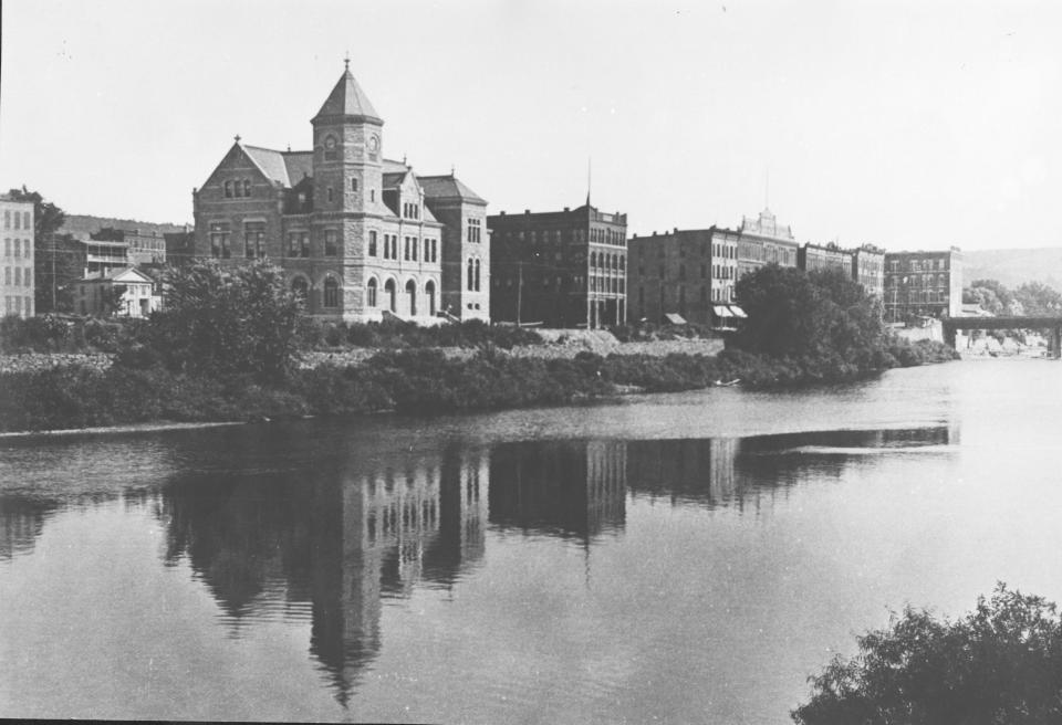 The view of Binghamton along the Chenango River, about 1880.