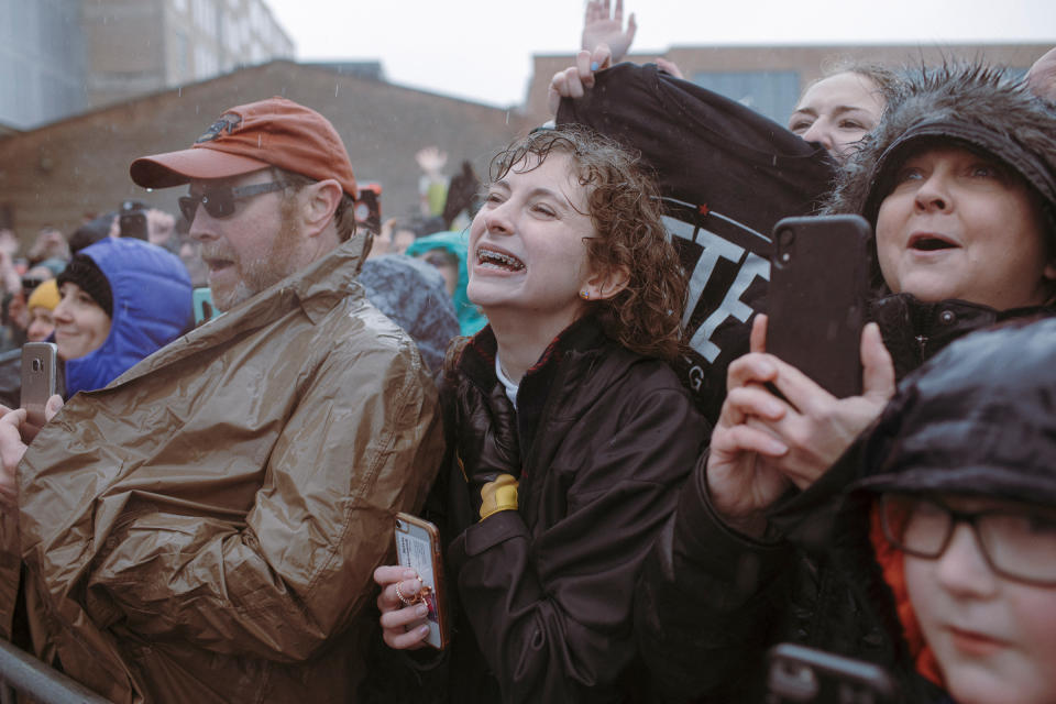 Supporters wait in the rain April 14 for Buttigieg’s presidential campaign announcement in South Bend. | Elliot Ross for TIME