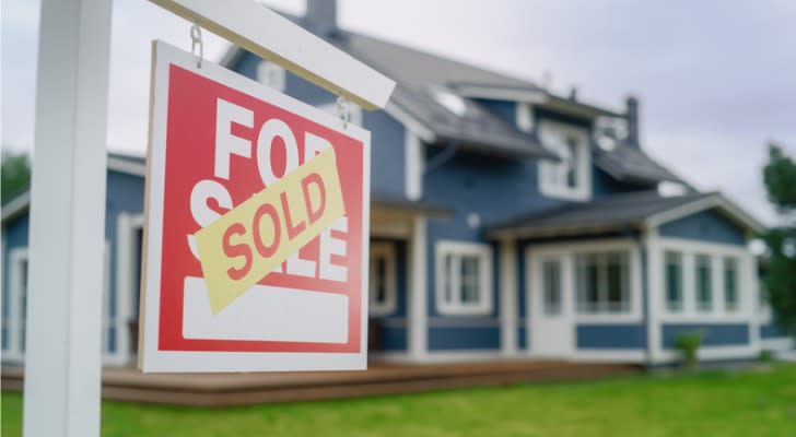 A for sale sign in front of a home that was recently sold.