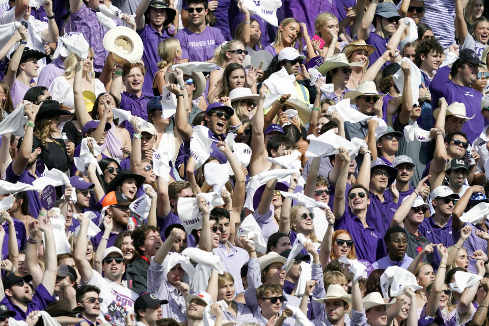 Oct 15, 2022; Fort Worth, Texas, USA; The TCU student section prepares for kick off during the first half of a game between the <a class="link " href="https://sports.yahoo.com/ncaaw/teams/tcu/" data-i13n="sec:content-canvas;subsec:anchor_text;elm:context_link" data-ylk="slk:TCU Horned Frogs;sec:content-canvas;subsec:anchor_text;elm:context_link;itc:0">TCU Horned Frogs</a> and the Oklahoma State Cowboys at Amon G. Carter Stadium. Mandatory Credit: Raymond Carlin III-USA TODAY Sports