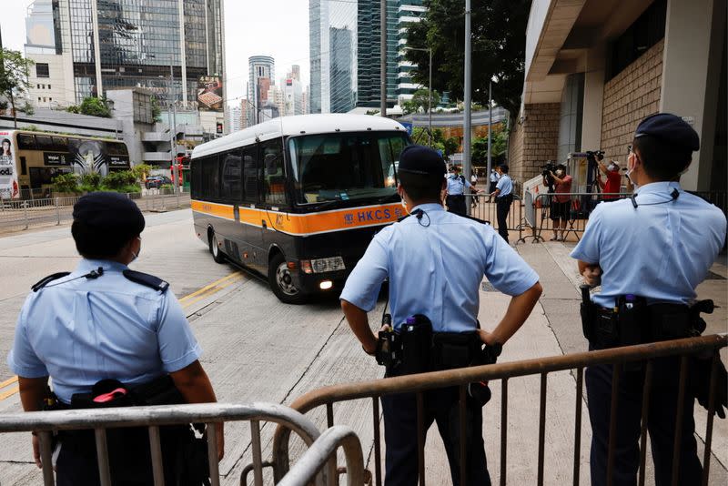 A prison van arrives High Court on the first day of trial of Tong Ying-kit, the first person charged under a new national security law, in Hong Kong