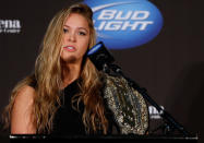 2. Ronda Rousey's skyrocketing popularity leads to creation of UFC women's division – In December, White made official one of the year's worst-kept secrets. He revealed the UFC would add a women's bantamweight division, all because of Rousey. Rousey defeated Miesha Tate in March to win the Strikeforce title and then defended it by stopping Sarah Kaufmann in August. She went on to become a celebrity of some note and was named UFC champion. Her first title defense is slated to be a main-event fight against Liz Carmouche at UFC 157.