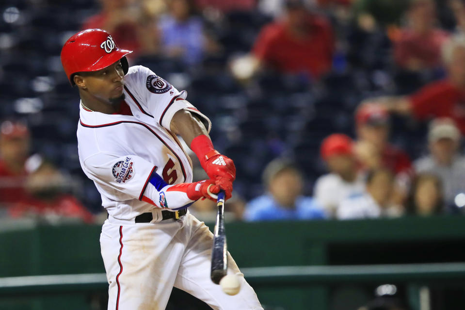 Washington Nationals Victor Robles (16) swings his bat and misses during the seventh inning of a baseball game against the Miami Marlins in Washington, Wednesday, Sept. 26, 2018. (AP Photo/Manuel Balce Ceneta)