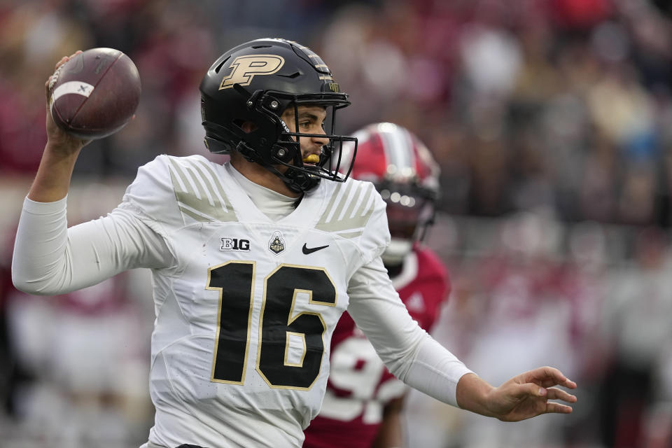 Purdue quarterback Aidan O'Connell (16) throws during the first half of an NCAA college football game against Indiana, Saturday, Nov. 26, 2022, in Bloomington, Ind. (AP Photo/Darron Cummings)