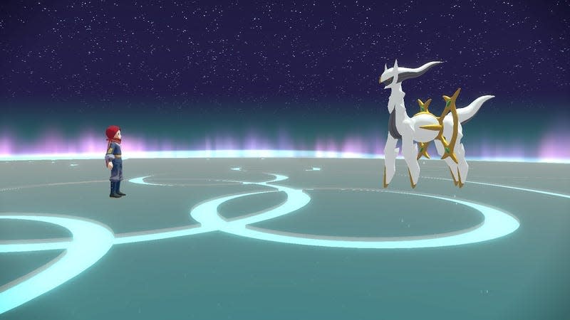 A Pokémon trainer is seen facing Arceus in a dark, ethereal space under the night sky.