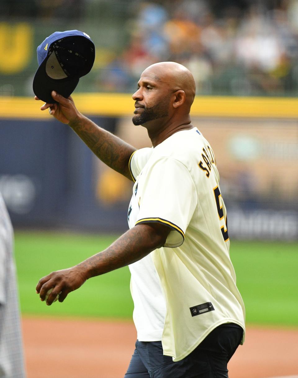 Aug 25, 2023; Milwaukee, Wisconsin, USA; C..C. Sabathia throws out the first pitch before the game between the Milwaukee Brewers and San Diego Padres at American Family Field. Mandatory Credit: Michael McLoone-USA TODAY Sports