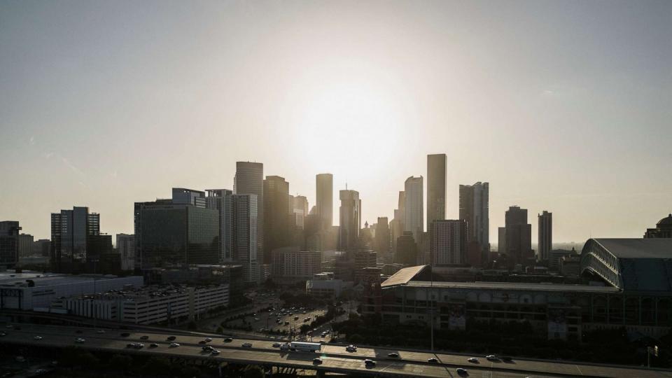 PHOTO: The skyline of downtown Houston is seen during excessive heat warnings for southeastern Texas on July 16, 2023. (Go Nakamura/Reuters)