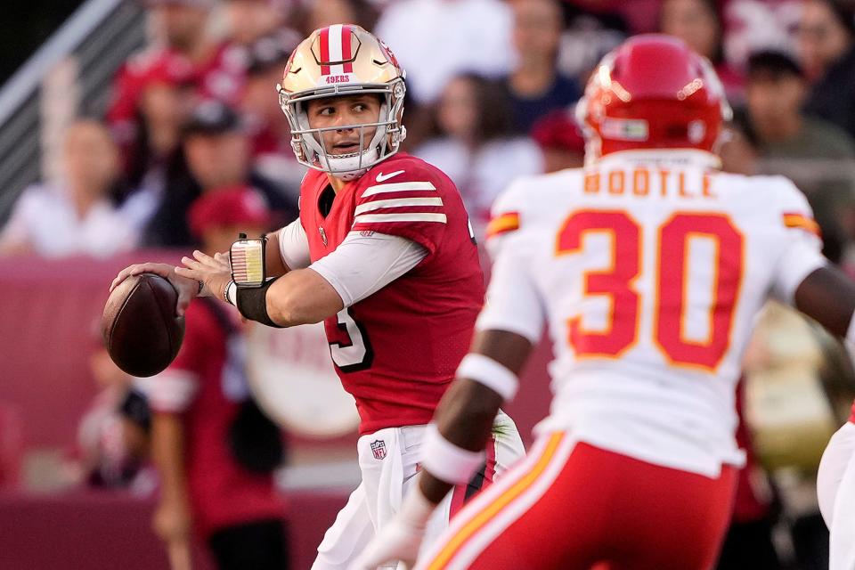 SANTA CLARA, CALIFORNIA - OCTOBER 23: Brock Purdy #13 of the San Francisco 49ers passes in the fourth quarter against the Kansas City Chiefs at Levi's Stadium on October 23, 2022 in Santa Clara, California. (Photo by Thearon W. Henderson/Getty Images)