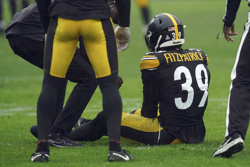 Pittsburgh Steelers safety Minkah Fitzpatrick (39) is helped after getting shaken up against the Jacksonville Jaguars during the first half of an NFL football game Sunday, Oct. 29, 2023, in Pittsburgh. (AP Photo/Matt Freed)