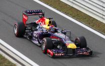 Red Bull Formula One driver Sebastian Vettel of Germany approaches the pit lane during the qualifying session for the Korean F1 Grand Prix at the Korea International Circuit in Yeongam, October 5, 2013. REUTERS/Lee Jae-Won (SOUTH KOREA - Tags: SPORT MOTORSPORT F1)