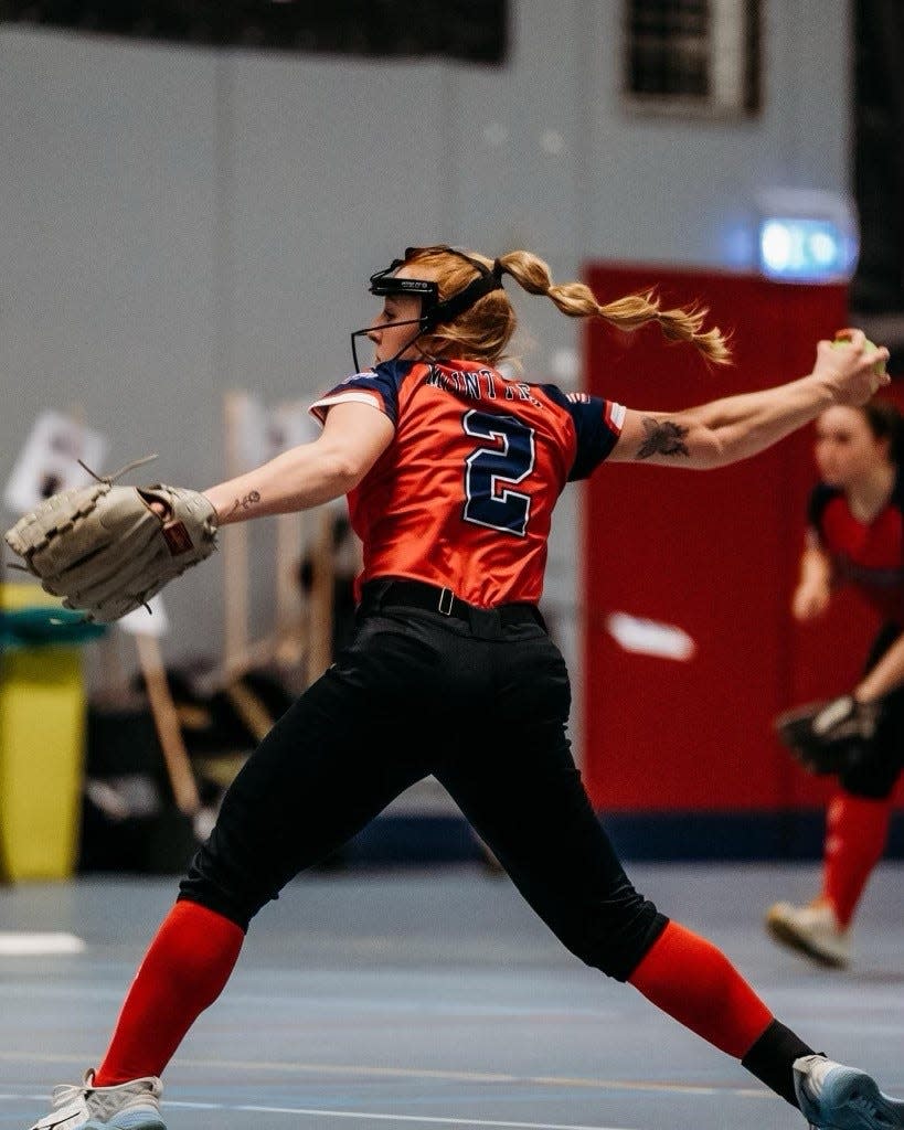 Jenna McIntyre, a former Harlem pitcher, throws a pitch for the USA team during The Cup indoor softball tournament in Schiedam, Netherlands, on Saturday, Jan. 14, 2023.