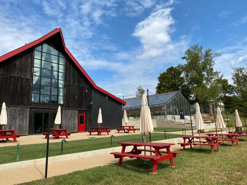 There are plenty of picnic tables available for outdoor dining at Barn8 at Hermitage Farm.