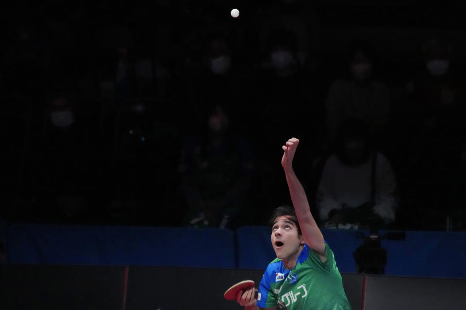 Brazil's Hugo Calderano tosses the ball to serve as he competes during a WTT tournament table tennis match, Sunday, Feb. 12, 2023, in Kawasaki, near Tokyo. Calderano is No. 5 in the sport’s ranking, he reached No. 3 a year ago, and he's defeated many of the top Chinese including No. 1 Fan Zhendong. (AP Photo/Eugene Hoshiko)