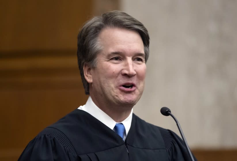 In this Aug. 7, 2018, photo. President Donald Trump's Supreme Court nominee, Judge Brett Kavanaugh, officiates at the swearing-in of Judge Britt Grant to take a seat on the U.S. Court of Appeals for the Eleventh Circuit in Atlanta at the U.S. District Courthouse in Washington. A new poll from The Associated Press-NORC Center for Public Affairs Research, released Wednesday, finds that nearly half of Americans _ 46 percent _ donâ€™t have a strong opinion on President Donald Trumpâ€™s nominee to replace the retiring Justice Anthony Kennedy on the high court.(AP Photo/J. Scott Applewhite)