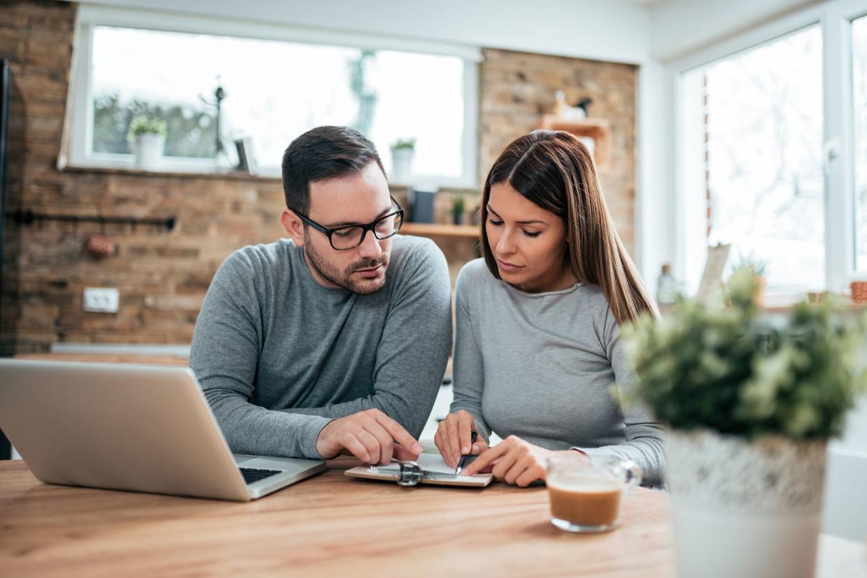 couple doing finances at home