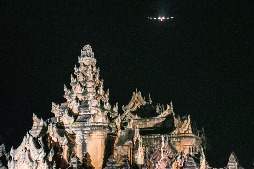 <p>Solar Impulse 2 flies over Inwa, the ancient imperial capital in the region of Mandalay, Myanmar during the leg five of the first round-the-world solar flight. (Solar Impulse/Revillard/Rezo.ch)</p>