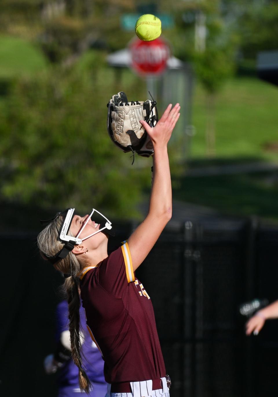 Bloomington North’s Kendyl Feutz (5) catches a pop up for an out during the softball game at South on Wednesday, April 24, 2024.