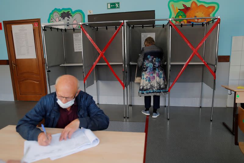 People vote during local elections in the Siberian city of Tomsk