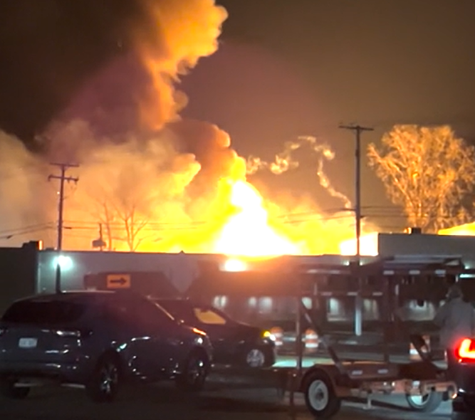 A fire at Select Distributors in Clinton Township was captured on camera by a metro Detroit resident on Monday, March 4, 2024.