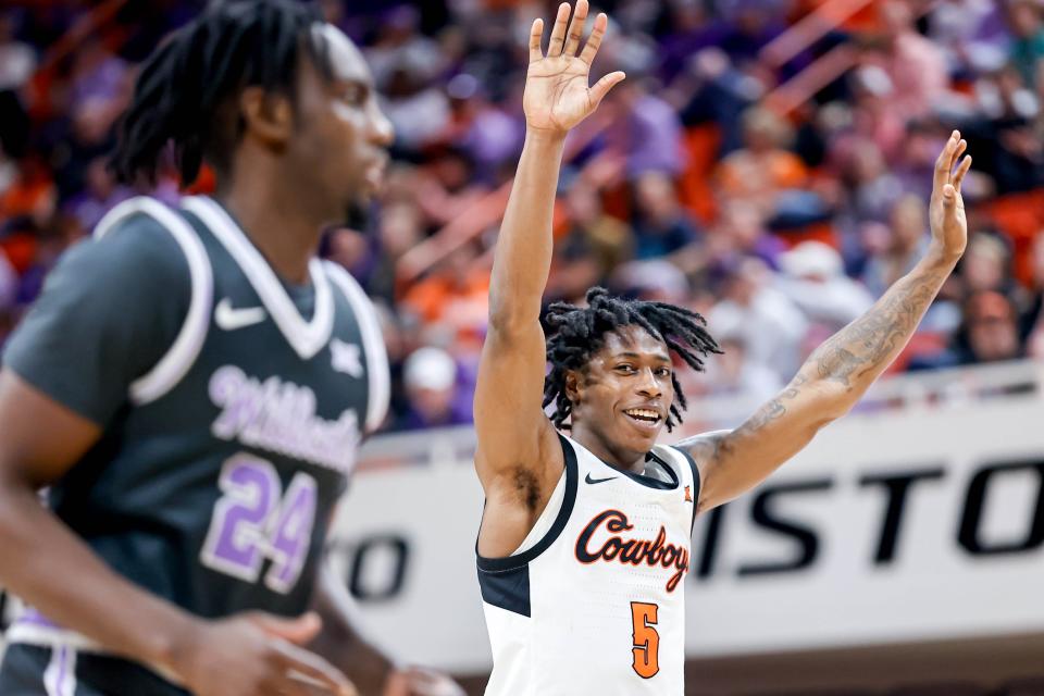 Oklahoma State guard Quion Williams (5) celebrates after dunking the ball in the second half during an NCAA basketball game between Oklahoma State (OSU) and Kansas State (KSU) at the Gallagher-Iba Arena in Stillwater Okla., on Saturday, Feb. 3, 2024.