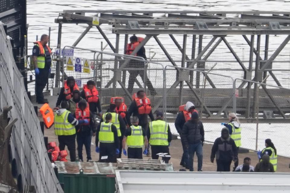 A group of people, thought to be migrants, are brought in to Dover by Border Force this week (PA)