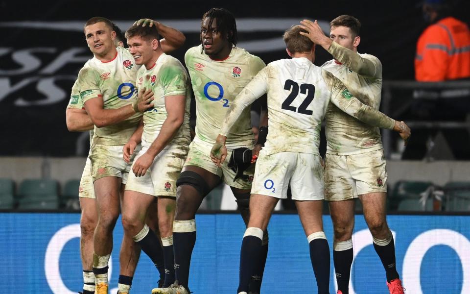 Henry Slade, Owen Farrell, Maro Itoje, Max Malins and Elliot Daly of England celebrate victory after the Autumn Nations Cup Final & Quilter International between England and France  - GETTY IMAGES