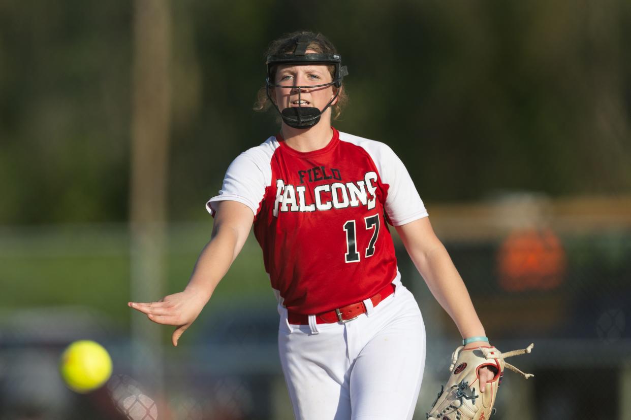 Field junior Maddie Burge pitches during a high school softball game against the Coventry Comets Monday, April 29 in Coventry Township.