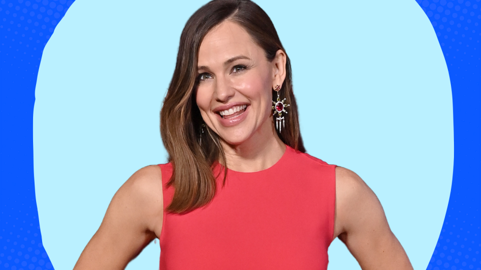 Jennifer Garner wearing a red top against a blue background