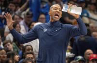Detroit Pistons head coach Monty Williams yells to his team during the first half of an NBA basketball game against the Dallas Mavericks, Friday, April 12, 2024, in Dallas. (AP Photo/Jeffrey McWhorter)