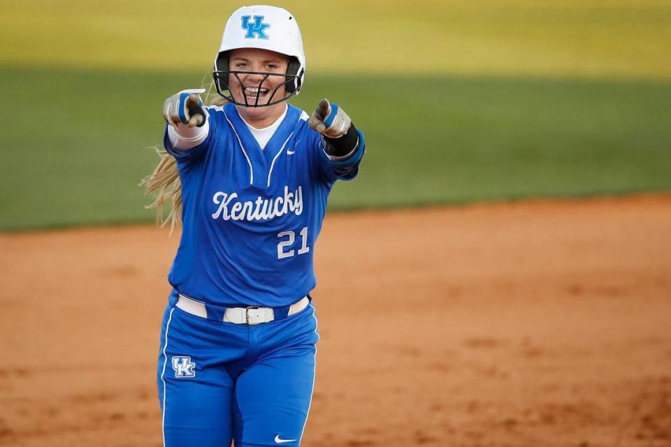 Kentucky infielder Erin Coffel (21) celebrates after hitting a home run during a game against Louisville.