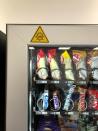 A vending machine installed with UV lights for sanitization is seen at Ericsson's office in Bucharest