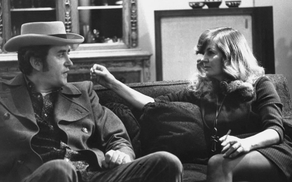 Robert Downey with actress Corinne Calvet in 1969 - Getty