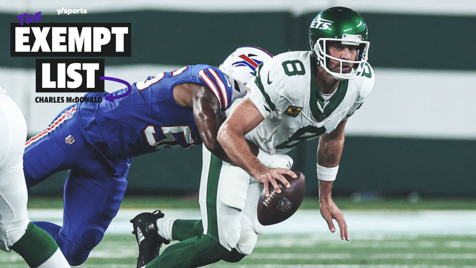 Sep 11, 2023; East Rutherford, New Jersey, USA; New York Jets quarterback Aaron Rodgers (8) is injured while being sacked by Buffalo Bills defensive end Leonard Floyd (56) during the first half at MetLife Stadium. Mandatory Credit: Vincent Carchietta-USA TODAY Sports