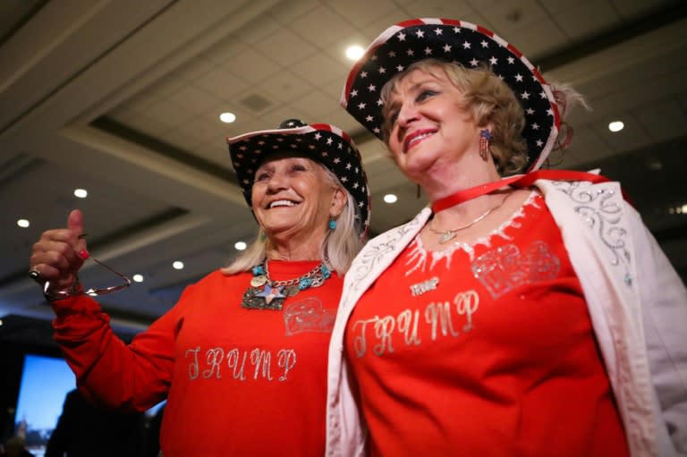 Supporters of Donald Trump, Carolyn Gibbs (L) and Cheryl McDonald (R) pose for photos in Burlingame, California, April 29, 2016
