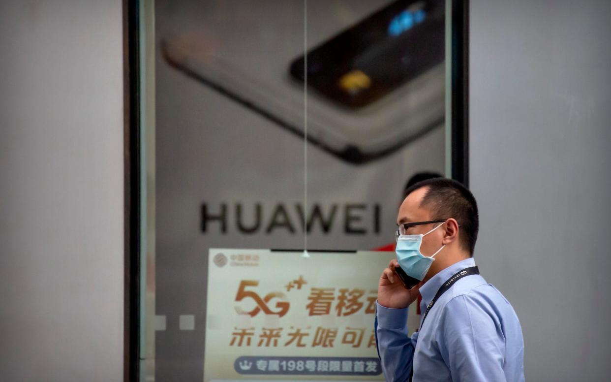 Huawei - Mark Schiefelbein/AP