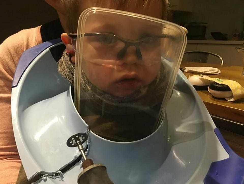 The boy was fitted with protective glasses before firefighters used a Dremel disc cutter to free him. (Photo: SWNS)