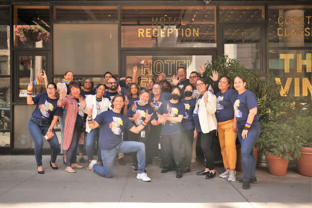 <p>Kimpton</p> Team members celebrate Pride Month outside the Kimpton Hotel Eventi in New York City.