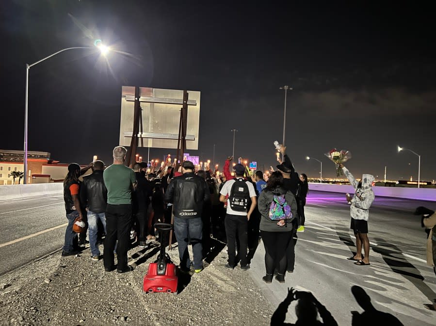 <em>A group of Las Vegas motorcyclists gathered at the location of Tomas’ death during a 2022 vigil. (Ginger Patterson)</em>