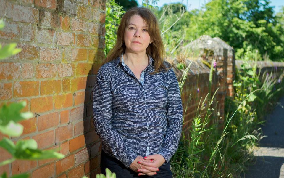 Lucy Charles, a mother who was suddenly faced with pulling her daughter out of her private school after her ex-husband decided to stop paying his share of the school fees, sitting in her garden