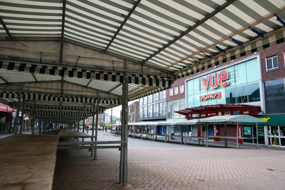 A town centre is near empty on a quiet Saturday afternoon during the Coronavirus pandemic lockdown in Newcastle-under-Lyme