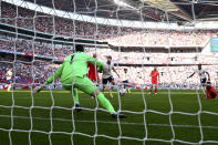 England's Jesse Lingard, 2nd right, scores the opening goal during the World Cup 2022 group I qualifying soccer match between England and Andorra at Wembley stadium in London, Sunday, Sept. 5, 2021. (AP Photo/Ian Walton)