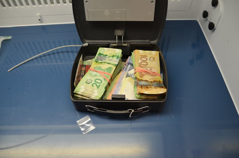 Victoria Police released this image of cash seized during an investigation that resulted in drug trafficking and weapons charges. The charges were later stayed.