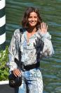 <p>Taylor Hill wears a breezy paisley jumpsuit as she arrives at the 2020 Venice Film Festival on Wednesday. </p>