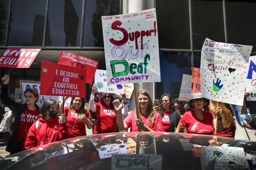 Los Angeles, CA - May 10: Supporters of controversial proposal to overhaul education for deaf and hard of hearing students that is expected a vote at LAUSD Board of Education, rally outside Los Angeles Unified School District Headquarters on Tuesday, May 10, 2022 in Los Angeles, CA. (Irfan Khan / Los Angeles Times)