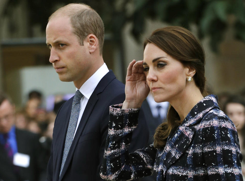 Britain's Prince William and his wife Catherine, Duchess of Cambridge, attend a paving stone ceremony for Victoria Cross recepients, at the Manchester Cenotaph in Manchester, Britain October 14, 2016.  REUTERS/Darren Staples 